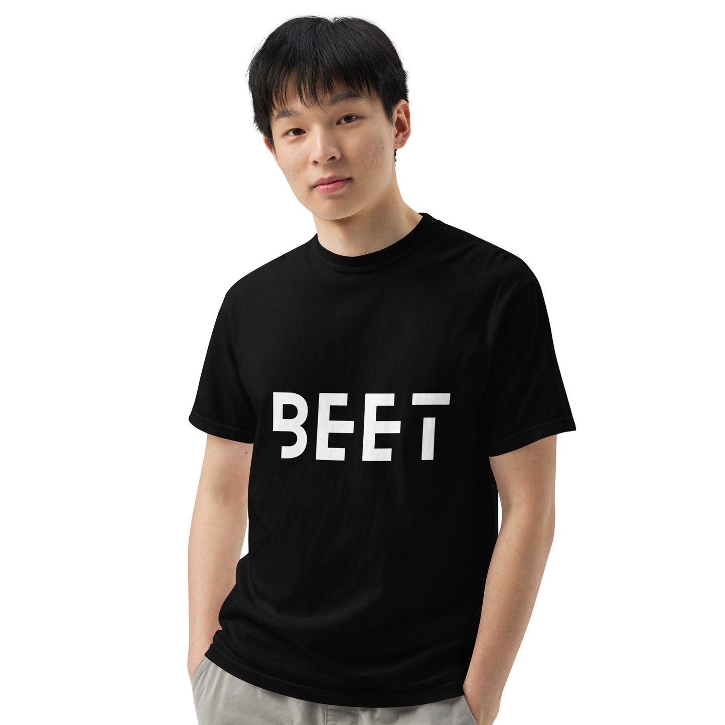 Unisex heavyweight black t-shirt with the BEET logo on the front and 'FEEL THE BEET' text on the back.